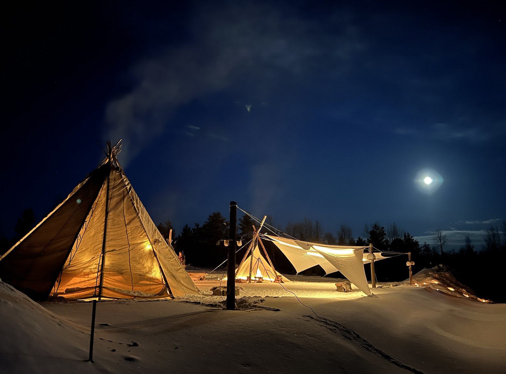Xwander Nordic-built Michelin influencer and product launch camp in Finnish Lapland — heated kota structures, branded service, Sami entertainment programming